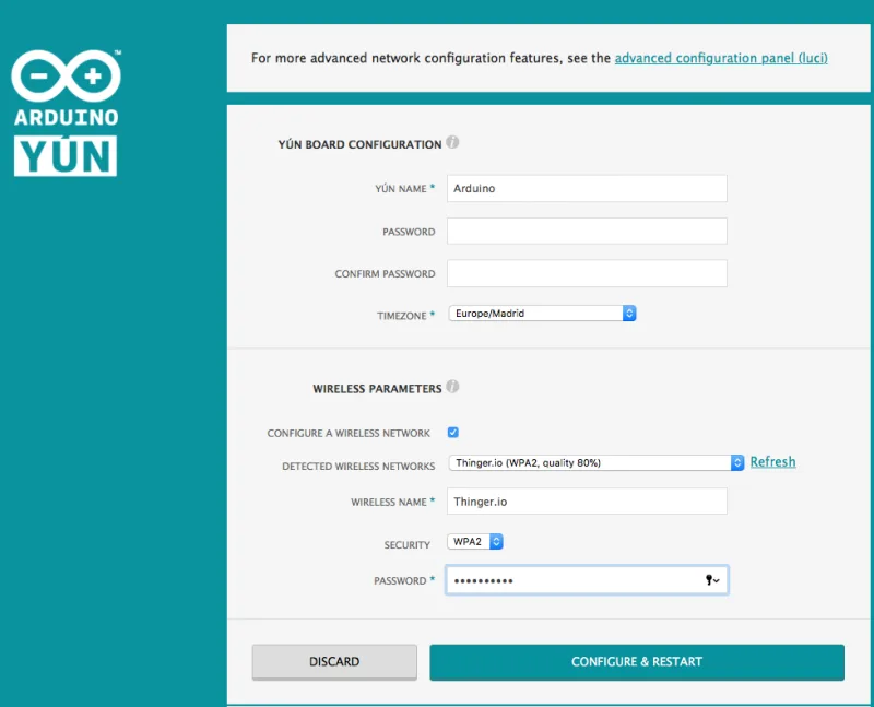 Yún web panel with the board name, password, time zone and the wireless network, security and password fields, and the Configure & Restart button