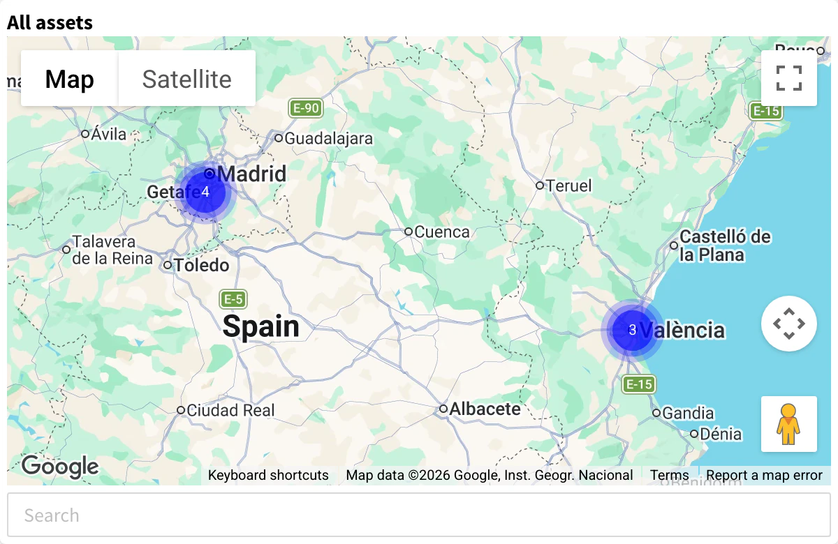 Assets Map with two clusters, four assets near Madrid and three in Valencia, and the search box